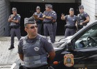 Federal officers outside the residence building of Brazil's former President Luiz Inacio Lula da Silva.