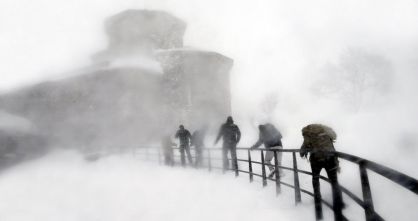 A group battles to get through a blizzard in Navarre.