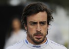 McLaren driver Fernando Alonso of Spain walks back to his team garage following a crash during the Australian Formula One Grand Prix at Albert Park in Melbourne, Australia, Sunday, March 20, 2016. (AP PhotoRoss Land)