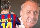 A football fan wearing a jersey of FC Barcelona pays tribute to late Dutch football star Johan Cruyff in a special condolence area set up at Camp Nou stadium, in Barcelona on March 26, 2016.  Cruyff, one of the greatest footballers of all time who dazzled with his artistry, died on March 24, 2016 at the age of 68 after losing a battle with lung cancer, prompting an avalanche of tributes from around the sports world.  AFP PHOTO  PAU BARRENA