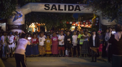 At 6am on the day of the ultramarathon, competitors line up in the main square of Urique to begin the 80-kilometer race. rn 