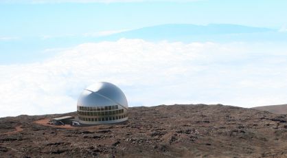 An artist's rendition of what the giant TMT telescope would look like atop the Mauna Kea.