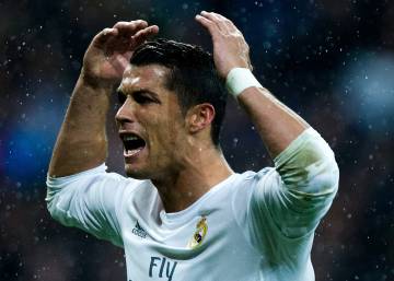 MADRID, SPAIN - APRIL 12: Cristiano Ronaldo of Real Madrid celebrates victory and reaching the semi finals with the crowd after the UEFA Champions League quarter final second leg match between Real Madrid CF and VfL Wolfsburg at Estadio Santiago Bernabeu on April 12, 2016 in Madrid, Spain. (Photo by Gonzalo Arroyo MorenoGetty Images)