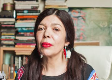 Susana Medina in her studio with a pet