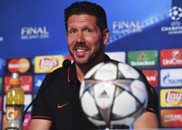 In this photo provided by UEFA Atletico Madrid's head coach Diego Simeone smiles during a press conference at the San Siro stadium in Milan, Italy, Friday, May 27, 2016. The Champions League final soccer match between Real Madrid and Atletico Madrid will be held at the San Siro stadium on Saturday, May 28. (Stuart Franklin UEFA via AP)