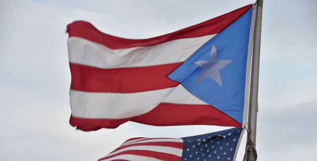 The US and Puerto Rican flags.