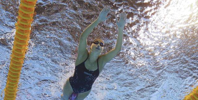 The refugee athletes competing under the Olympic flag