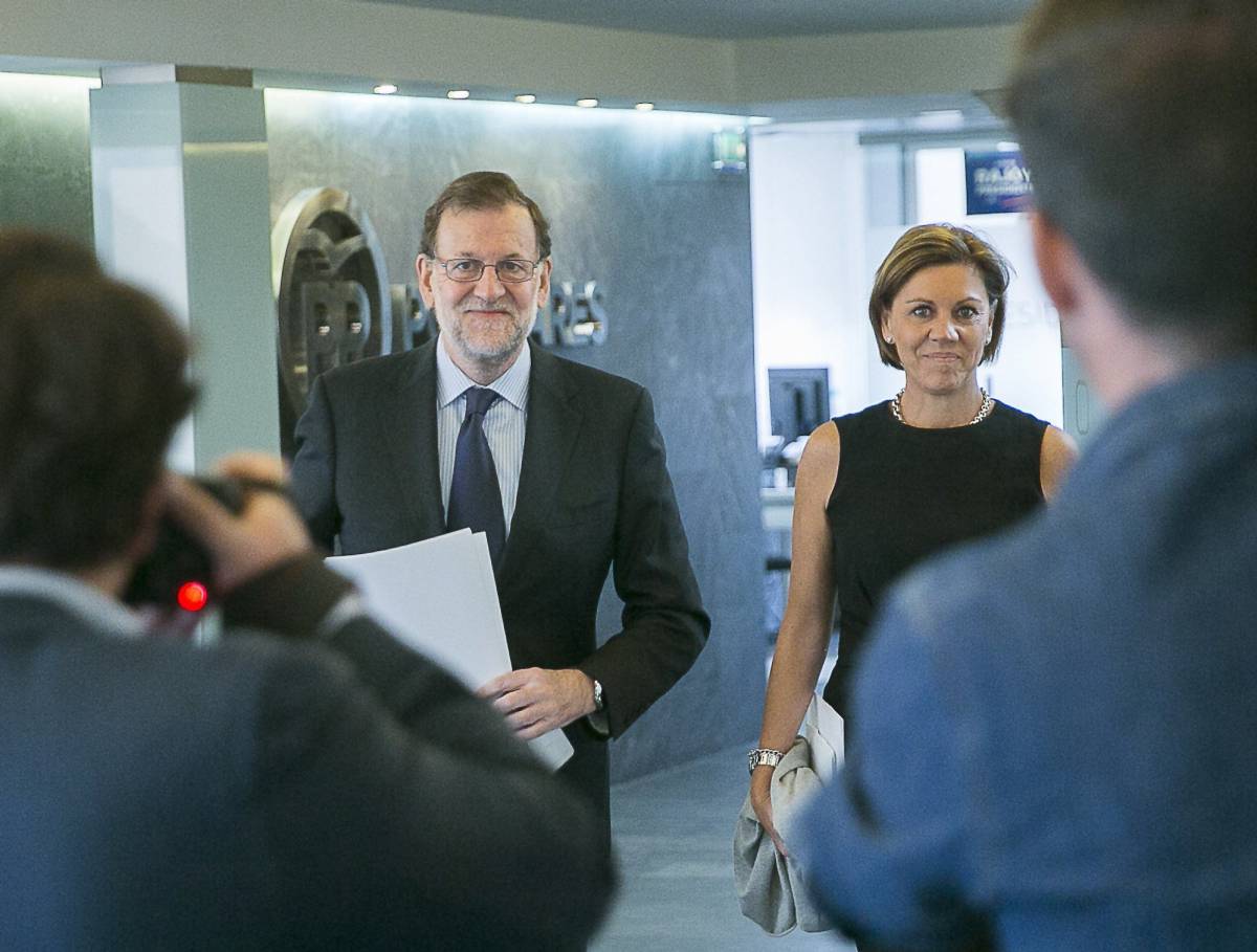 Mariano Rajoy y Mar&iacute;a Dolores de Cospedal, a su llegada al comit&eacute; de direcci&oacute;n del PP el 3 de octubre.
