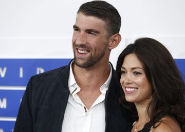 Michael Phelps y Nicole Johnson, en un 'photocall' el pasado mes de agosto.