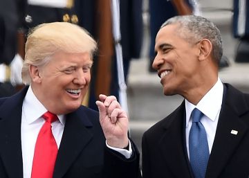 US President Donald Trump and former President Barack Obama talk on the East steps of the US Capitol after inauguration ceremonies on January 20, 2017, in Washington, DC.   AFP PHOTO  Robyn BECK