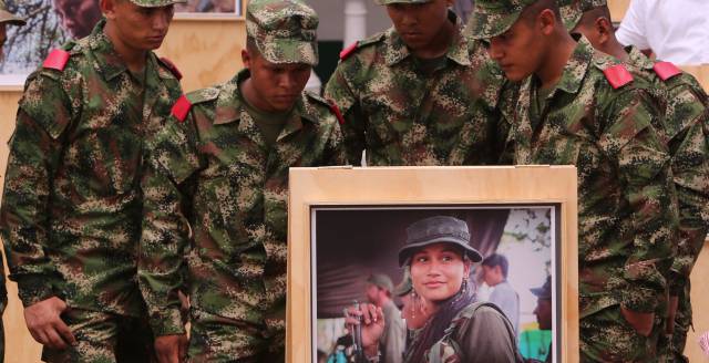 Soldiers at an exhibition on the conflict.