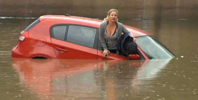 The woman's car slowly sank.