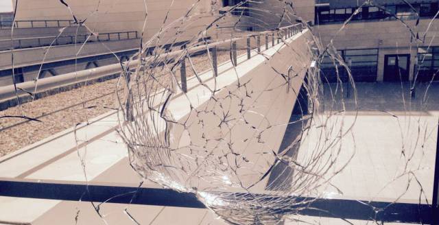 A window at the ICMAT hit by a stray bullet.