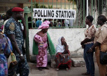 FILE- In this Thursday Dec. 1, 2016 file photo, Gambians wait to cast their vote at a polling station during the Presidential election in Banjul, Gambia. A Gambian court has postponed a decision on the disputed presidential election until next week. The delay of the ruling party's case until Monday, Jan. 16, 2017 sets up a collision course with the opposition, which still plans the inauguration of President-elect Adama Barrow on Jan 19. (AP PhotoJerome Delay File)