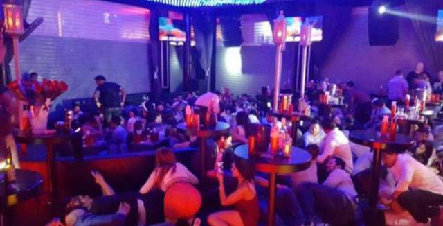 The scene inside the Blue Parrot as the shooting began.