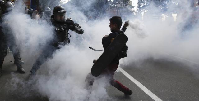 Police and protestors clash in Bogota.