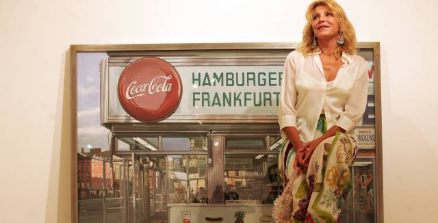 Carmen Cervera next to Richard Estes’ Nedick’s.