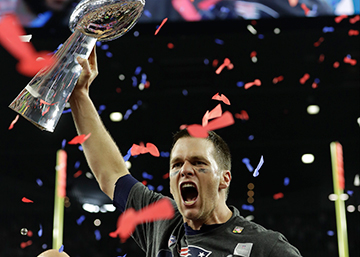 Tom Brady #12 of the New England Patriots holds the Vince Lombardi Trophy after defeating the Atlanta Falcons 34-28 in overtime during Super Bowl 51 at NRG Stadium on February 5, 2017 in Houston, Texas. The Patriots defeated the Falcons 34-28 after overtime.  AFP PHOTO  Timothy A. CLARY