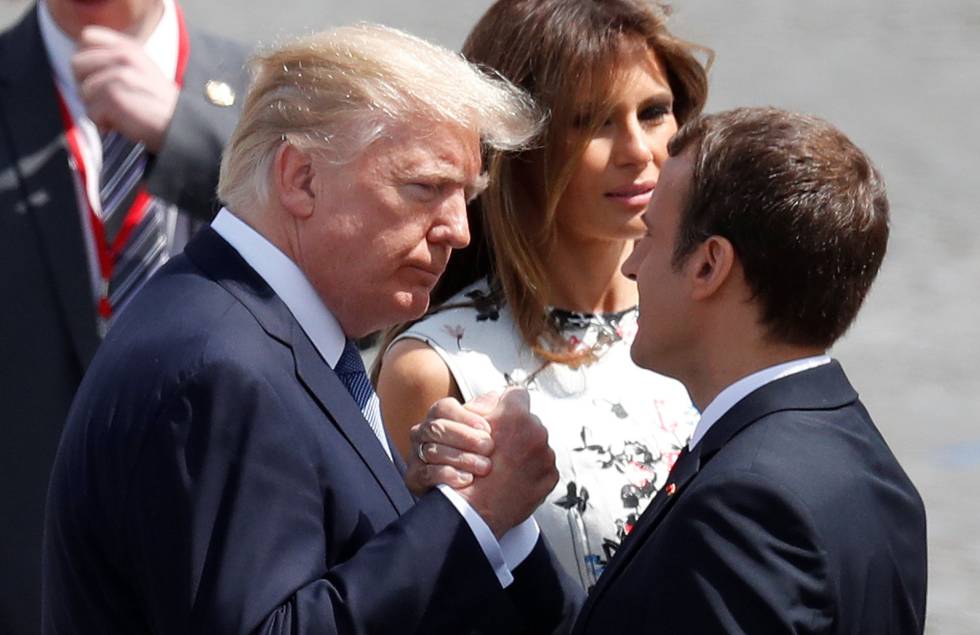 Macron y Trump junto a Melania Trump este viernes en París.