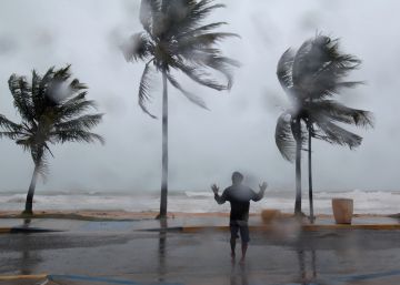 A man reacts in the winds and rain as Hurricane Irma slammed across islands in the northern Caribbean on Wednesday, in Luquillo, Puerto Rico September 6, 2017. REUTERSAlvin Baez