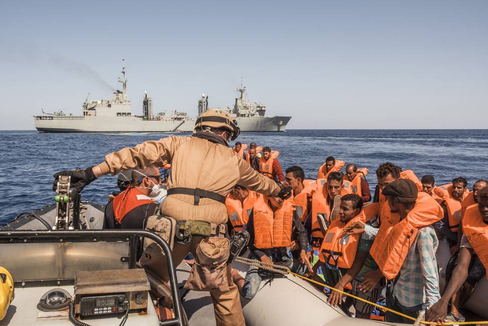 A group of migrants from the Ivory Coast in the ship after being rescued close to Libyan territorial waters.