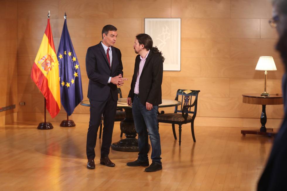 Pedro SÃ¡nchez with Unidas Podemos leader Pablo Iglesias.
