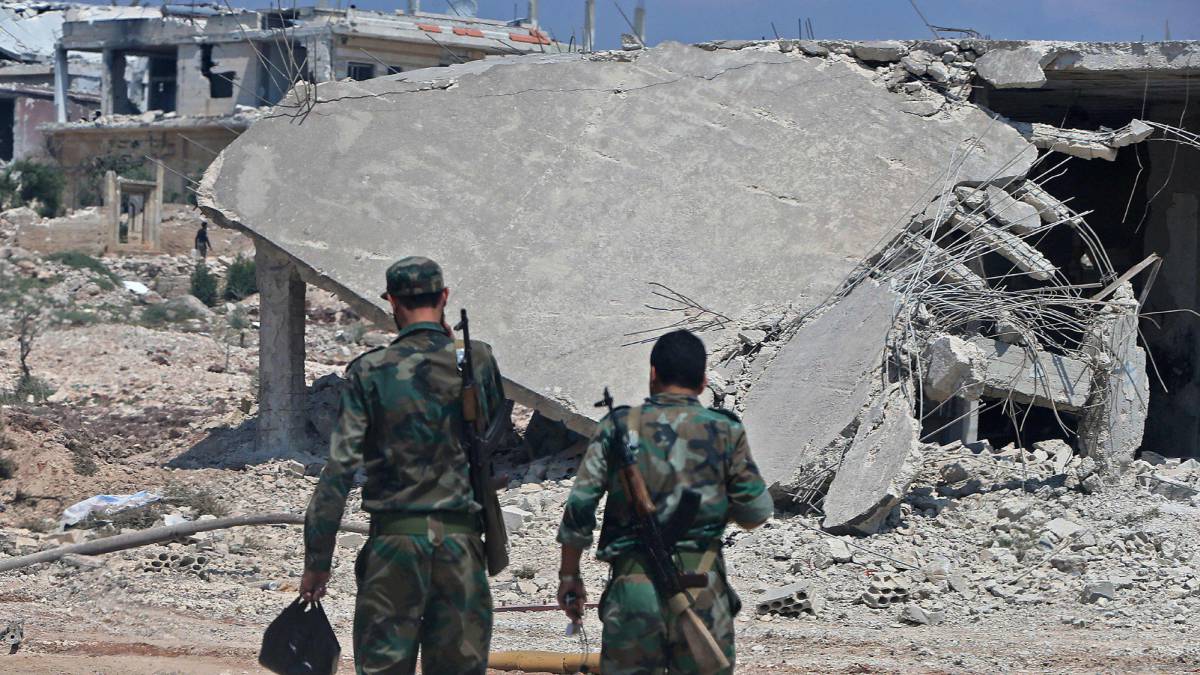 Tropas gubernamentales sirias en Jan Sheijún.