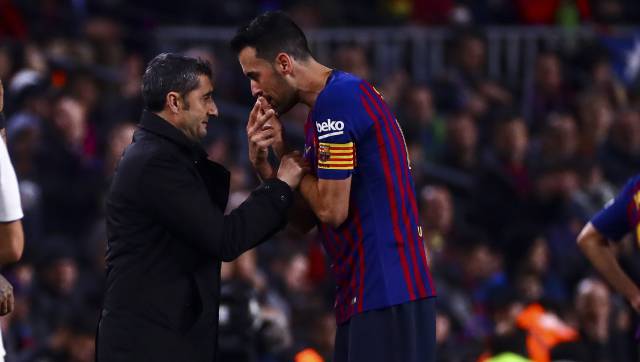 Valverde habla con Busquets.