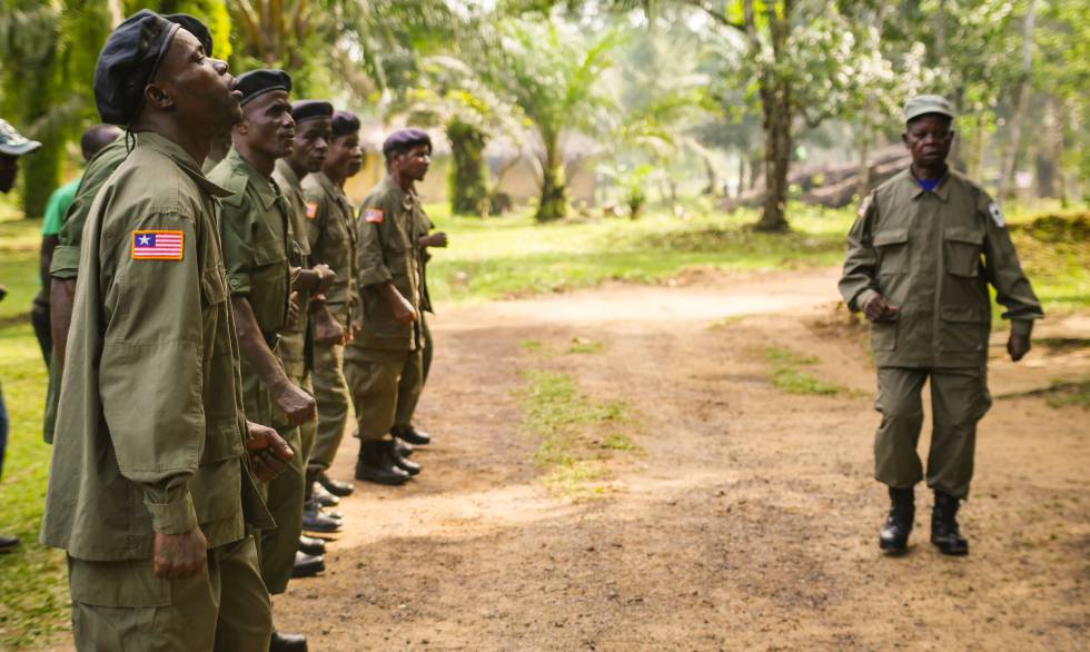 Sapo National Park agents line up before starting their work shift. |