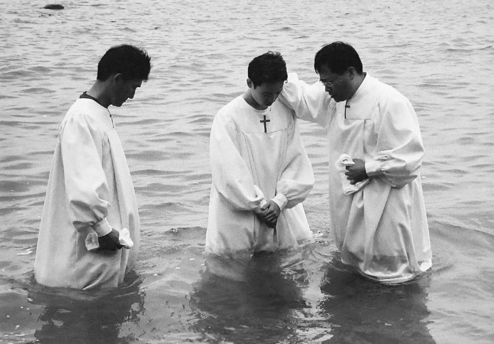Aaron Lee is baptized on an island in Korea in 2005 after being locked up there for being gay.