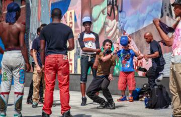 Baile callejero en el neoyorquino barrio de Harlem.