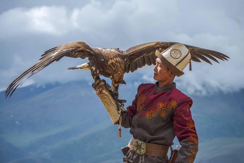 A Kyrgyz falconer in the Tian Shan Mountains.
