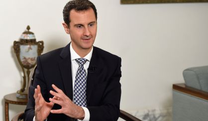 President Al-Assad during the interview.