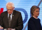 Clinton and Sanders at odds with Obama over deportations