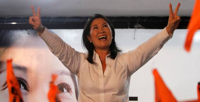 Keiko Fujimori greets her supporters.