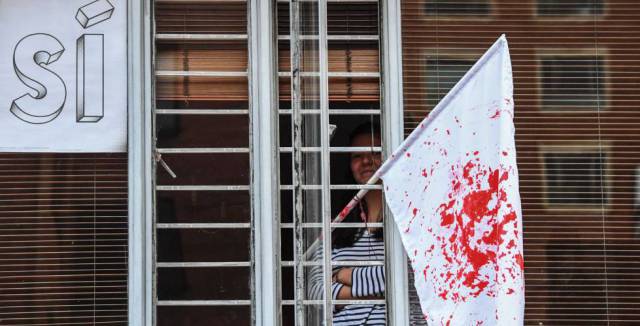 A white flag stained blood red after Colombia's referendum.