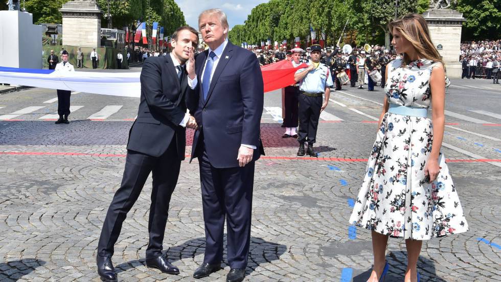 Los presidentes Macron y Trump en los Campos Elíseos de París tras haber asistido al desfile militar. 
