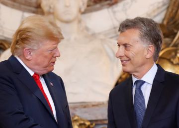 Donald Trump y Mauricio Macri se saludan en su encuentro previo a la cumbre en Buenos Aires.