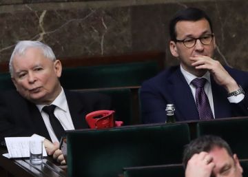 Warsaw (Poland), 20122019.- Leader of the Polish Law and Justice (PiS) rulling party Jaroslaw Kaczynski (L) and Polish Prime Minister Mateusz Morawiecki (R) during the parliamentary debate on the new judiciary bill in Sejm (lower house) in Warsaw, Poland, 20 December 2019. Last week, MPs from Law and Justice (PiS) submitted a comprehensive draft amendment to provisions relating to the courts and Supreme Court, as well as to administrative and military courts, and prosecutors. According to reports, European Commission has sent letters to Polish authorities appealing for the suspension of work on the new bill as it can threaten the rule of law and is in contrary to EU values. (Polonia, Varsovia) EFEEPAWOJCIECH OLKUSNIK POLAND OUT