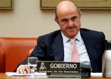 Rajoy & Guindos, un `cover up´