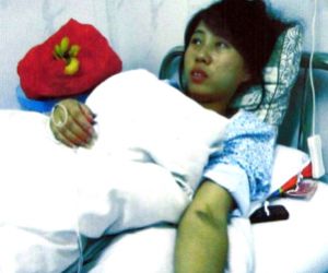 Feng Jianmei, la mujer obligada a abortar en el séptimo mes de gestación.