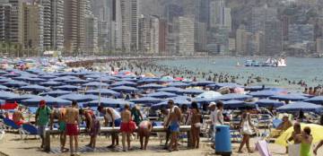 Bathers on the beaches of Benidorm.