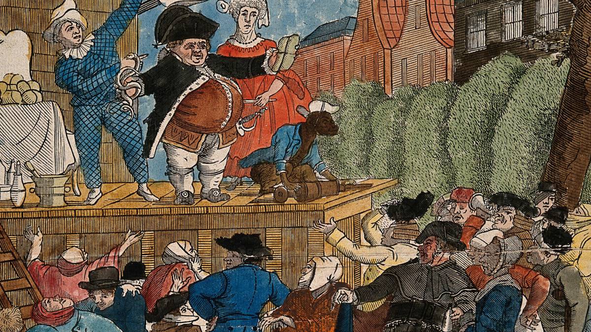 Un vendedor itinerante sobre el escenario.